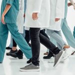 medical center staff standing together edited