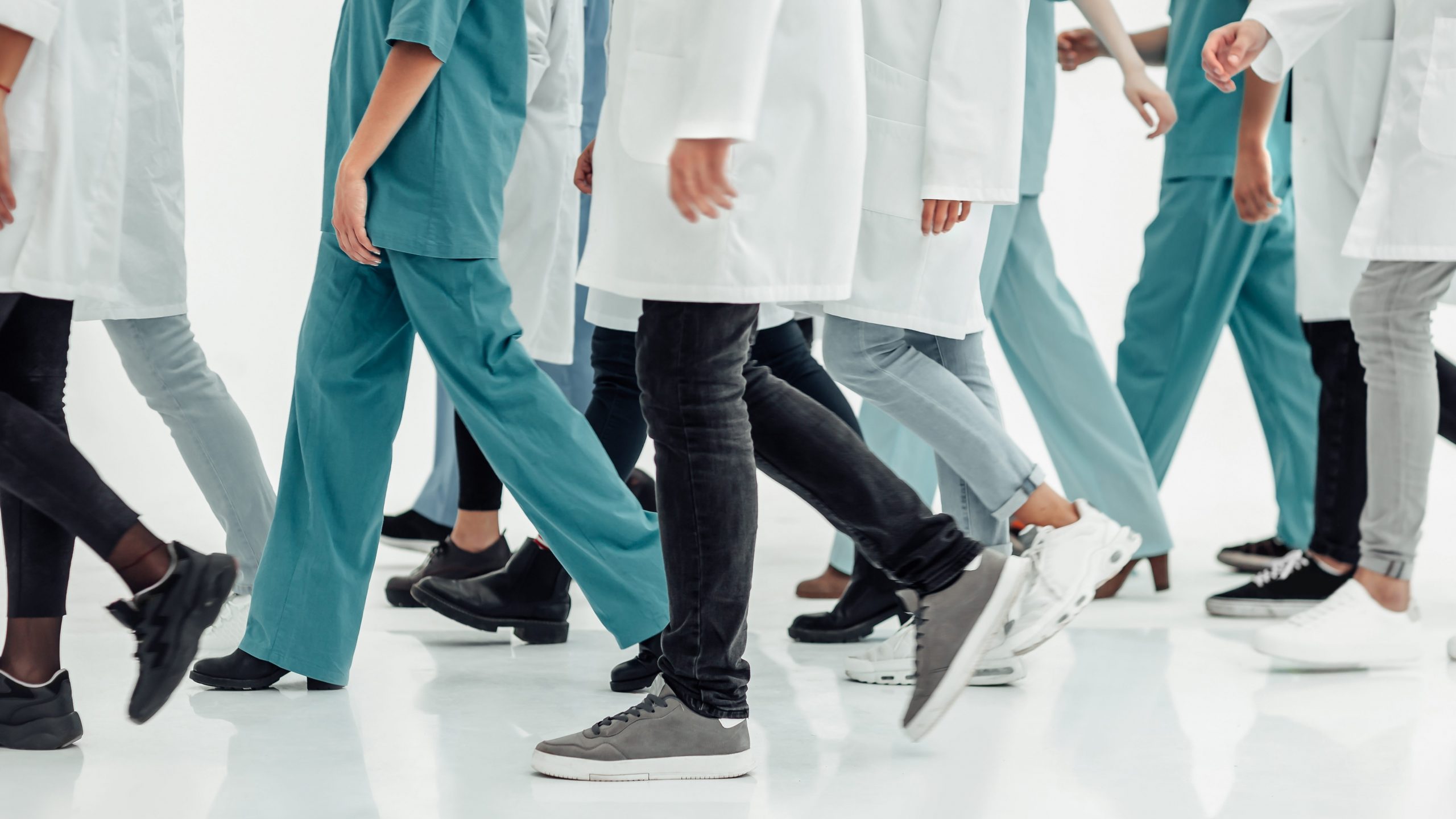 medical center staff standing together edited scaled